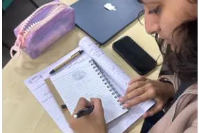 girl writing notes
