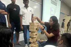 students playing jenga